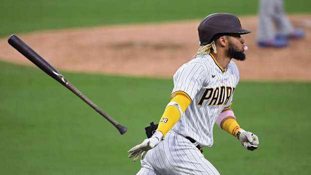 Aug 3, 2020; San Diego, California, USA; San Diego Padres shortstop Fernando Tatis Jr. (23) tosses his bat after hitting a home run during the fifth inning against the Los Angeles Dodgers at Petco Park. Mandatory Credit: Orlando Ramirez-USA TODAY Sports